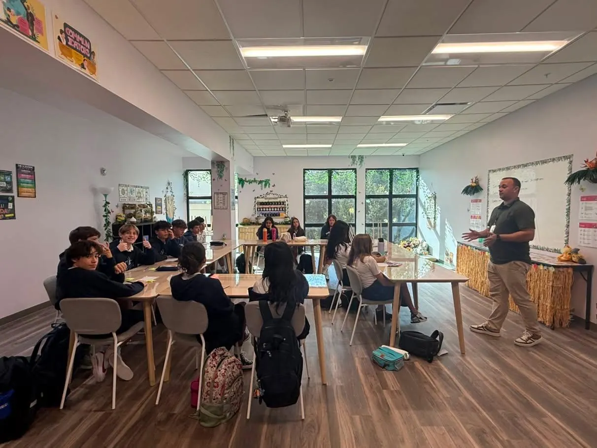 Middle school students in a class discussion