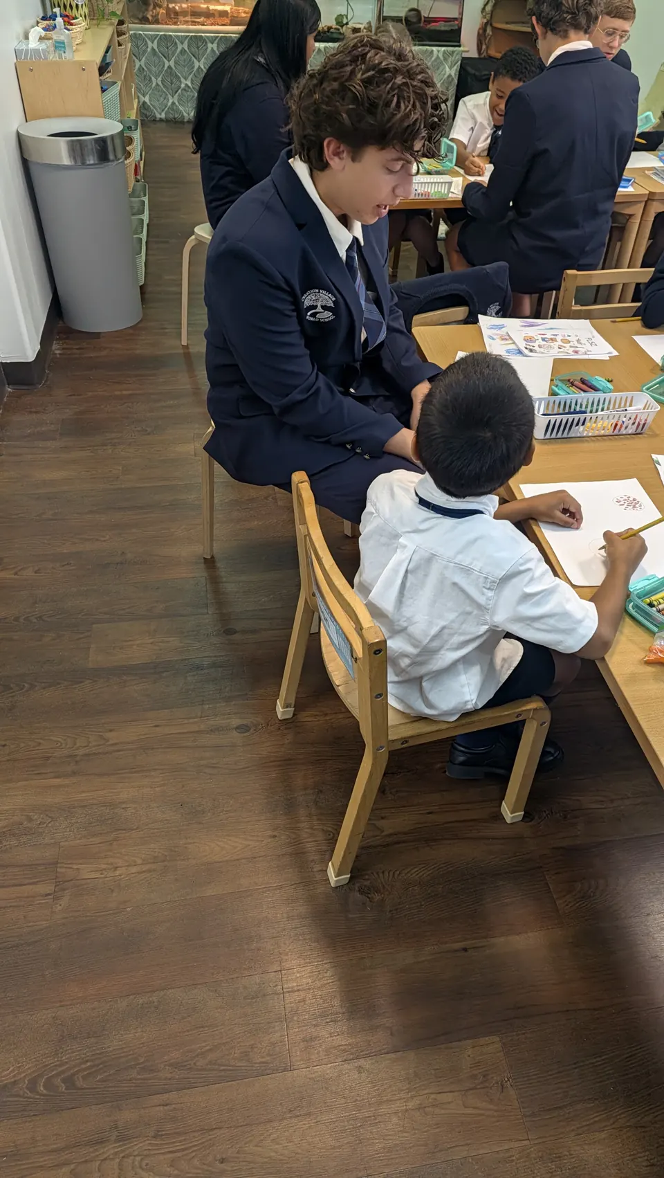 Students working together at a classroom table